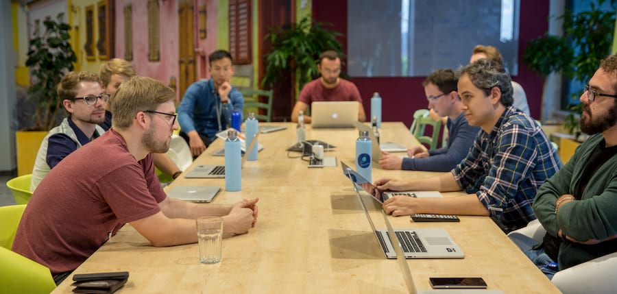 A group of trivago developers in discussion with Tobias Koppers, original creator of webpack