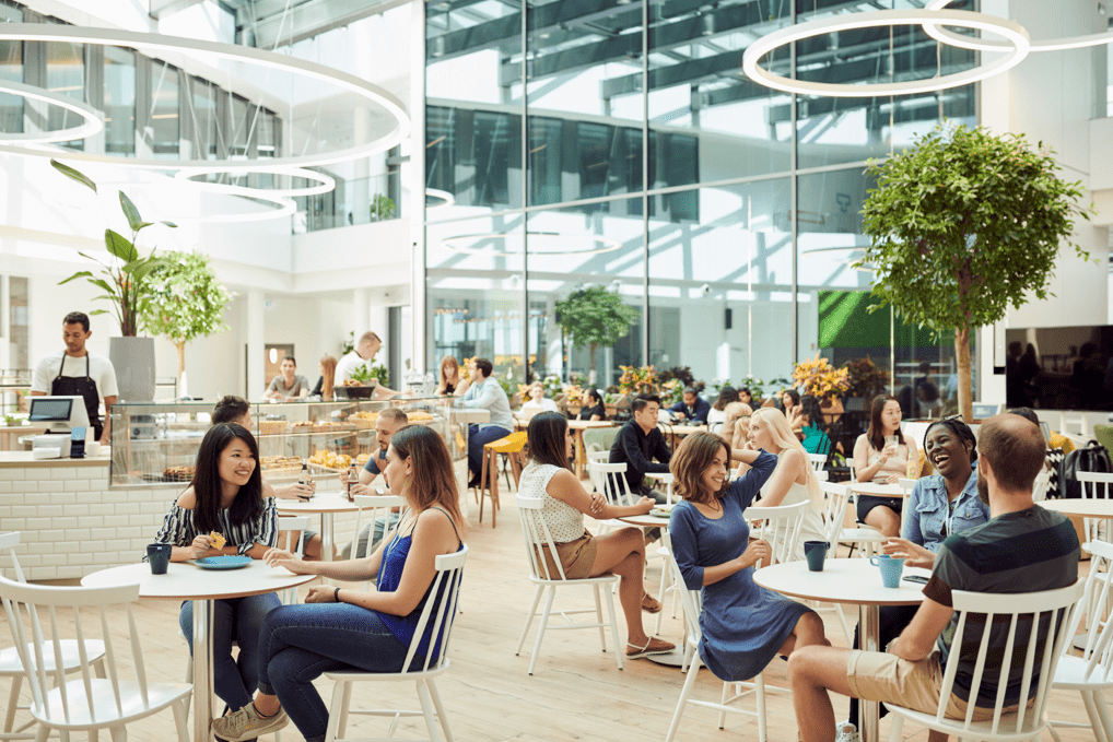 People in barista bar at trivago's new office At trivago's barista bar