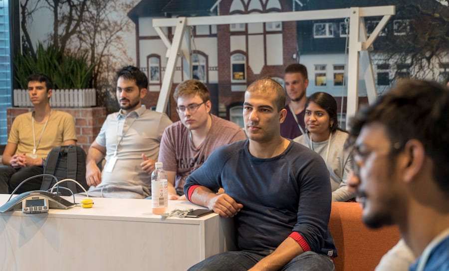 The group during a meeting with a participant from the previous year The group during a meeting with a participant from the previous year