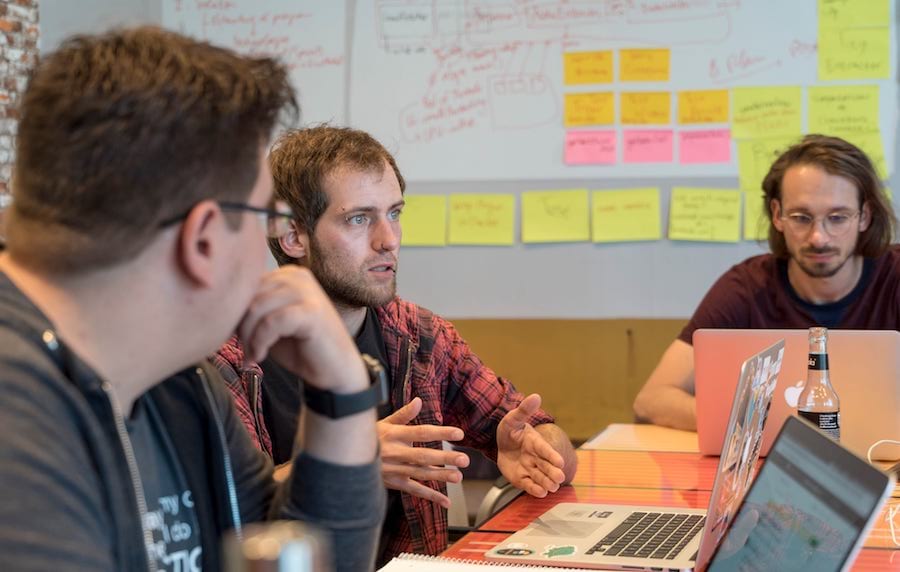 Mentors explaining the goals of their project Mentors explaining the goals of their project