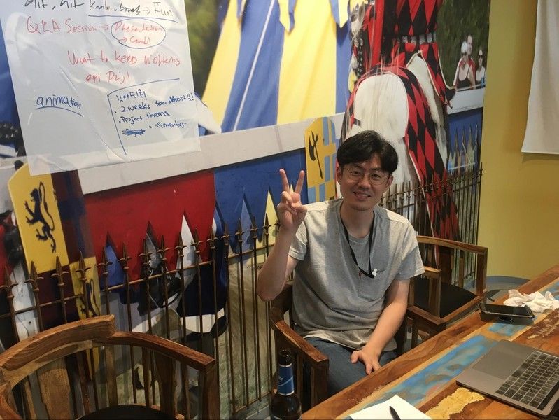 Gyumin working during a brainstorming session after kicking off the project